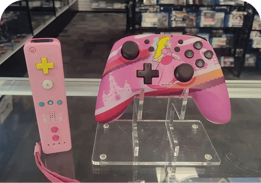 pink Nintendo controllers